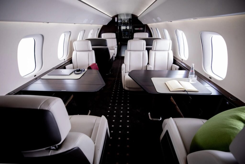 Spacious private jet cabin with comfortable individual seats